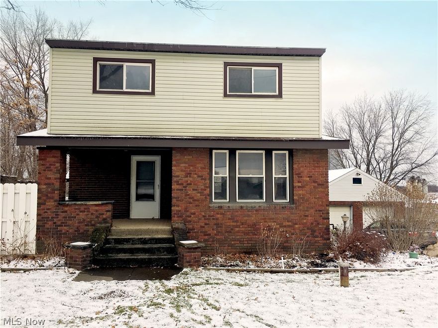 Character & charm abound in this centrally located home surrounded by greenery, Rose of Sharon, peach trees & occasional roaming deer in Plain LSD. Home boasts 4 bedrooms, 1.5 baths, walkout basement & 1 car-attached garage with 2-car I-1 Light Industrial detached garage – perfect for small business. Welcoming large foyer glows from org. stained-glass window. Eat-in kitchen has Energy Star appliances, desk & wine rack. Wide hardwood trim, archway with columns & leaded glass storage, built-in window seat encompass main living/dining. Back 1st-floor room could be bedroom/office. Crafted built-ins, spacious storage & closets throughout. Front upstairs bedroom potential as possible bedroom w/sitting area, class room or offices. Finished basement offers lots of light & access to driveway.
Auto enthusiasts, electricians & landscapers will like 2469 sq ft, heated garage, built '85, with 2 over-sized bays & service window. Additional features include large office, finished full-length 2nd flo