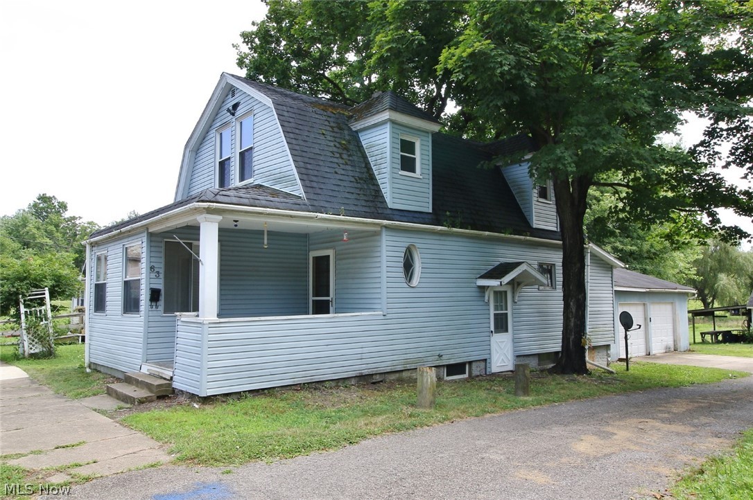 Great little home with potential on the end of the cul-de-sac. Smaller, low maintenance yard. Covered front porch, Detached 2 car garage. Bank owned property being sold in "As Is" condition.