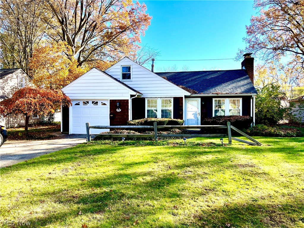 This quaint, neutral 3-4 Bedroom cape cod-styled home with a gable roof is located on a bucolic, tree-lined street. In the lovely neighborhood of Kew Gardens where Blackman-Taft craftsmanship abounds. No cold feet in the winter with wonderful radiant heated-flooring on the main level! Welcoming eat-in kitchen with ample cupboard space. All appliances convey. Expansive Living Room with cozy wood-burning fireplace with mantle. Double doors open to formal dining space or play room overlooking a beautiful, grassy partially fenced backyard w/brick patio. A relaxing place to enjoy the seasons unfold! Comfortable Family room addition renovated 2021 (possible 4th bedroom). The 2nd floor is ideal for a bedroom and has overflowing attic storage! This floor plan is so versatile, you can live on one level or both. Trendy, neutral palette achieved throughout much of the home with lush carpeting replaced 2021. Roof & Gutters 2021. Hot Water Tank @2019-20. Zoned heating. Less than 2 miles to enjoy t