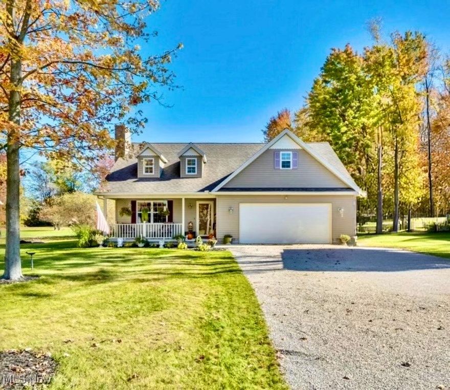 This unique three bedroom, two and a half bath home is custom designed with impressive cathedral ceilings, sky dormers, and a beautiful floor-to-ceiling stone fireplace. The open staircase adds the perfect touch to the space. The open layout of the living room, kitchen, and dining area makes it ideal for entertaining throughout the year. On the main level, the spacious master bedroom includes a private full bathroom, walk-in closet, linen closet, and sliding glass doors that lead to a tranquil deck with parklike views. The large deck and grilling patio overlook a beautifully landscaped yard, cozy fire pit, and a workshop/storage shed.

Upstairs, you’ll find a full bathroom, linen closet, and two bedrooms. One of the large bedrooms, features a window seat, walk-in closet, and an office area in the front bonus room. The garage has plenty of cabinet storage, and the extra-wide driveway beside it is perfect for parking a camper or boat.

The home sits on just under an acre with a beautifully landscaped yard and a partial view of Lake Erie. The private lakefront park of Arcola Shore Estates is less than 1,000 feet away. Nearby, the 182-acre Arcola Creek Park in Lake County Metro Park offers over 500 feet of Lake Erie beach, a new large pavilion, picnic spots, and some of Ohio’s best Steelhead fishing. Around the corner, the State Park Marina is equipped with boat ramps. Many wineries with full service restaurants and live entertainment are just minutes away. This is a fantastic opportunity you won’t want to miss!