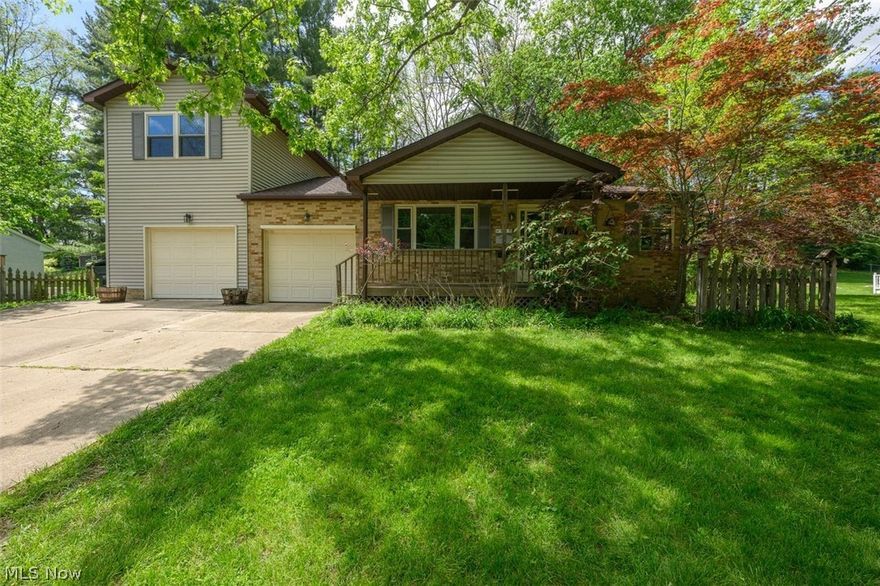 This 4 bedroom, 2 bath home offers so much space and opportunity! Bring your personal decorating ideas and get creative while having fun making it your own. The living room, dining area, and first floor bedrooms offer hard wood flooring and would be beautiful if refinished. The kitchen offers plenty of oak cabinets, granite counter tops, under cabinet lighting, and appliances. The large family room, and second floor were previously added and offer lots of additional living space. There are 3 rooms finished in the basement you can use for your own specific use. The unfinished section of the basement includes the laundry area, a utility sink, and commode. There is also a work shop area with cabinets and a work bench. Two attached garages, and a stairway access to the attic above the second garage offer more storage space. The sloped, park-like rear yard was a joy for the sellers to overlook from their balcony. They enjoyed watching lots of wildlife, flowers, and taking in all nature has to offer.  New Roof April 2026, new 50 gal. hot water tank April 2026. (To settle estate - seller to make no repairs) (condition of appliances is unknown).