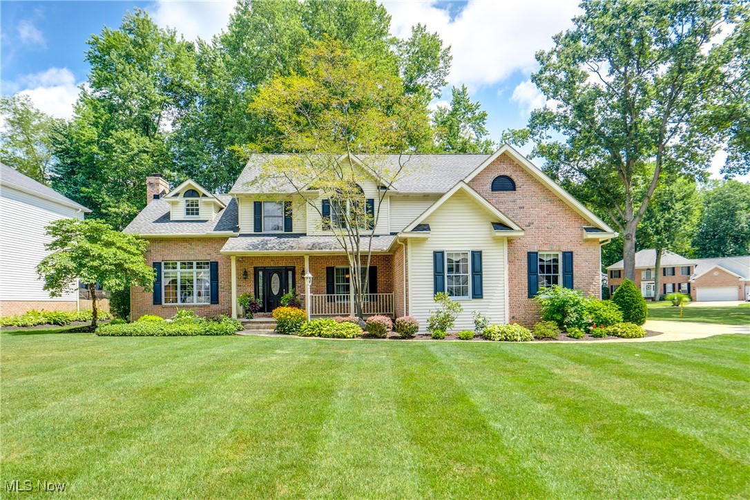 Experience refined living in this meticulously maintained Colonial, offering over 3,400 sq/ft of finished space nestled on a beautifully landscaped 0.80-acre lot in Jackson Township! This home boasts four spacious bedrooms, two full and two half baths, and a finished basement complete with bonus and a recreation rooms. From the front porch, enter the 2 story foyer open to the Family and Dining Rooms. The oversized dining room features hardwood flooring and crown molding. The heart of the home features a stunning two-story family room with a wood-burning fireplace and brick hearth, seamlessly connected to the eat-in kitchen. The stunning Kitchen features Mullet Custom Cabinetry, Slate Appliances, Quartz Counters and access to a serene screened-in porch. Down the hall, you'll find the 1/2 bath, the laundry room, and a den with tons of light. Upstairs, discover four bedrooms, including the oversized master suite that offers vaulted ceilings, walk-in closet, and an ensuite that has a jetted tub, updated quartz counters and flooring. The additional three bedrooms are wonderfully sized and provide ample closet space. Completing the second floor is the hall full bath that features a tub shower combo, a double vanity with Formica counters, and newer LVP flooring. Venturing to the basement, you'll find a LARGE rec room, a bonus room, and convenient 1/2 bath. Outside, there is a 3-car attached heated garage, large stamped concrete patio, and tons of yard space. Plus, the home is close to Belden Village, Lake Cable, and highways. Don't miss your chance to see this beautiful home; schedule your showing today! Turn key and move in ready. Roof 2011, Central Air 2024, HWT 2017 and Garage Doors 2024.