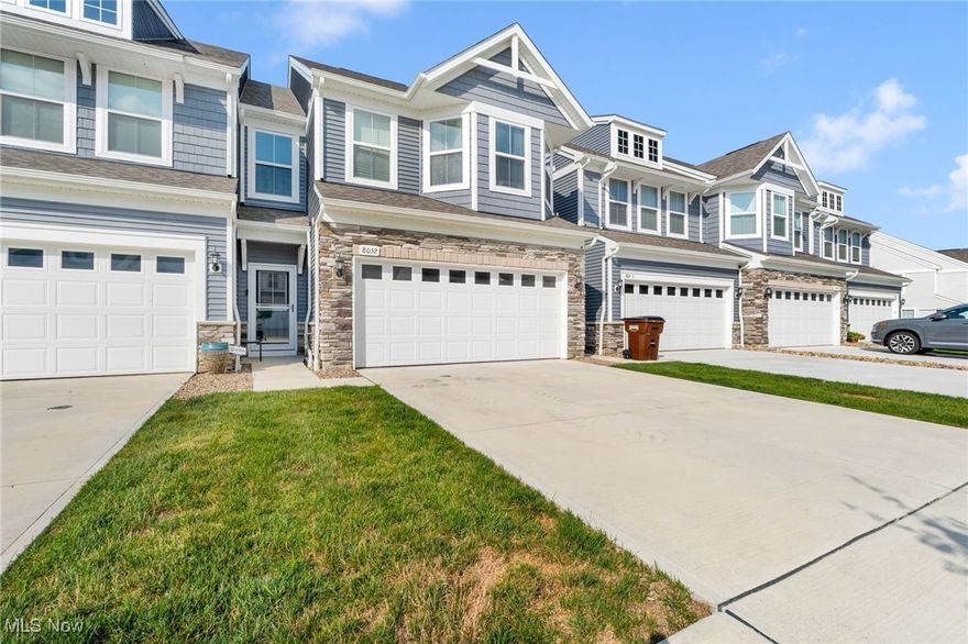 Step into this beautiful home in the sought-after Dipper Lane and Renaissance Place community of Aurora, Ohio, where thoughtful design meets modern comfort. Built in 2023, this 3-bedroom, 2.5-bath residence offers over 2,200 sq. ft. of inviting living space. The spacious master suite boasts a charming sitting nook—perfect for a reading corner, private office, or cozy retreat—along with a bonus room for added flexibility. The open-concept kitchen features granite counters, a large island, and a bright morning room bump-out, ideal for casual dining, a home office, or a sunny lounge area, with sliding doors leading to a beautifully paved patio perfect for outdoor entertaining. The living room centers around a custom shiplap fireplace, creating a warm and stylish focal point for gatherings year-round. Additional highlights include high ceilings, recessed lighting, an upstairs laundry room with sink, and a 2-car attached garage. Enjoy low-maintenance living with an HOA that covers landscaping, snow removal, and property management—just minutes from local shops, dining, and Aurora’s top-rated schools.