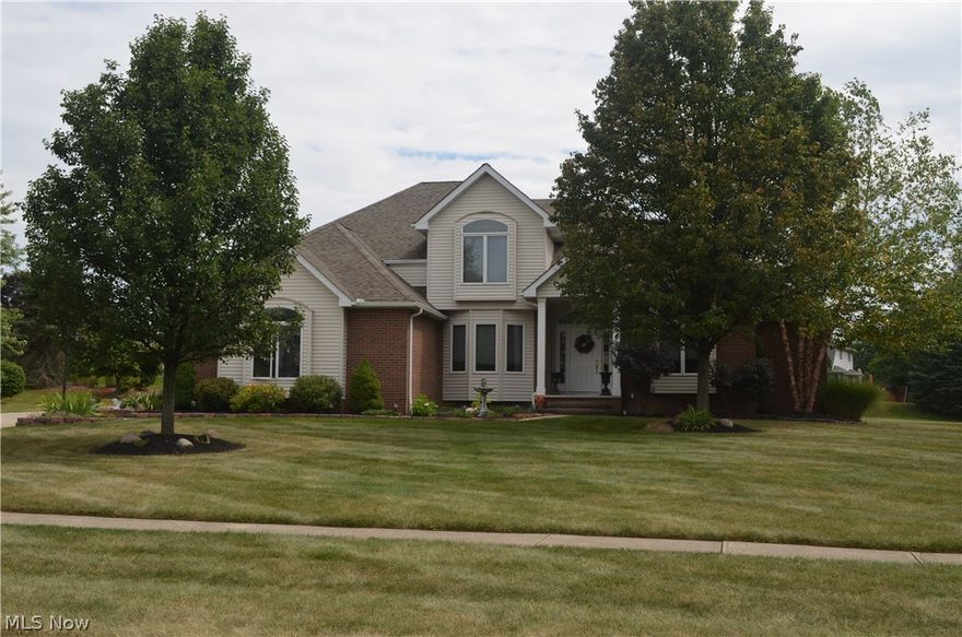 Elegance at its finest.  Welcome home to this 2,576 sq ft. Center Colonial.   Walk-in to the 2 story foyer leading into the living room with Cathedral Ceilings and a beautiful gas fireplace.  The spacious eat-in kitchen with ceramic tile has all stainless steel appliances, a center island, large pantry and recessed lighting.  Off of the kitchen is your 1st floor laundry room and a beautiful Sun/Sitting Room with cathedral ceilings, sky lights, wet bar and a beautiful view of your deck and backyard.  The formal dining room and the library/den is off of the foyer.  The first floor finishes with a master bedroom and master bathroom with a garden tub, sky lights, his and her sinks and a walk-in closet.  The second floor features three additional bedrooms with an additional full bath with two sinks.  The 12-course basement is ready to be finished for any use. Crown Molding and Solid Oak doors through out house. Enjoy the advantages of a 3-car side load garage with hot and cold water and gas