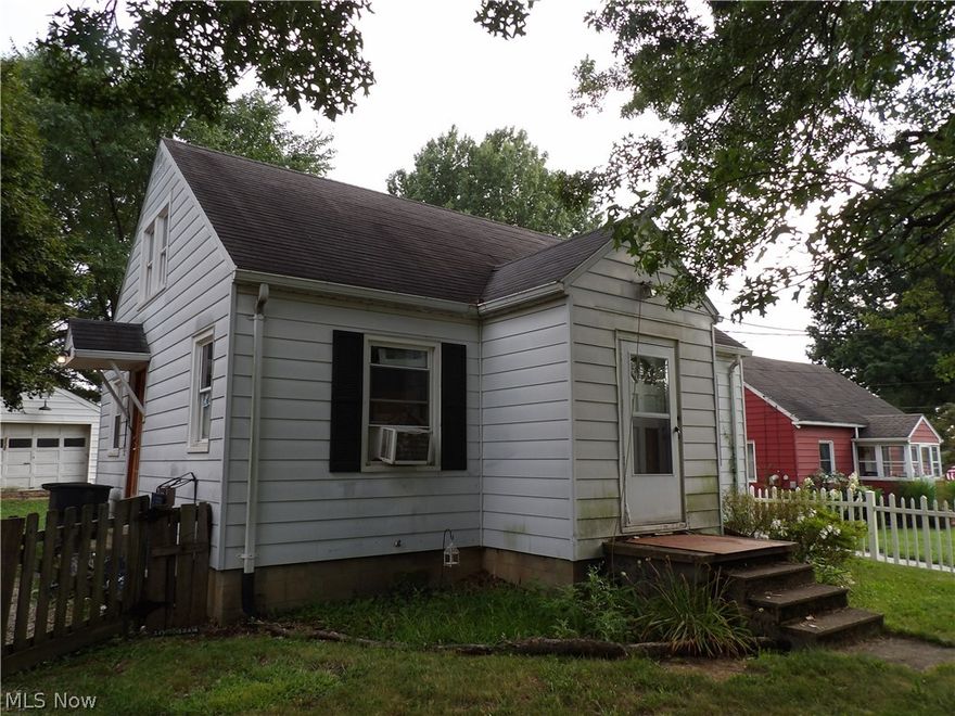 This house needs completely rehabbed.  The house appears to have a very good foundation.  It's a great "L" shaped lot.  The back of the lot is 48 x 105 ft and fenced.  With a lot of work, this will be a prize.