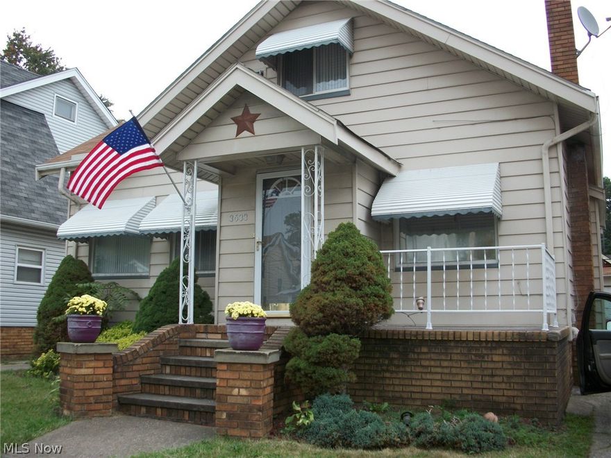 A real pleasure to show, this master bungalow offers 3 bedrooms (+small bonus room ) 3 full baths, beautiful hardwood floors, decorative fireplace, cozy den or office adjoins the spacious living room. Kitchen has ceramic tile and all appliances stay including washer and dryer. Living room and dining room have cove ceilings and dining room has built in cabinets. A full bath on all levels, new carpet in bedrooms on main level and the driveway has been leveled and looks great, basement has a finished rec room, glass block windows, laundry area and storage room. Full fenced yard, deck, 2 car detached garage plus on street parking is allowed. Call today...lot of house for the money.