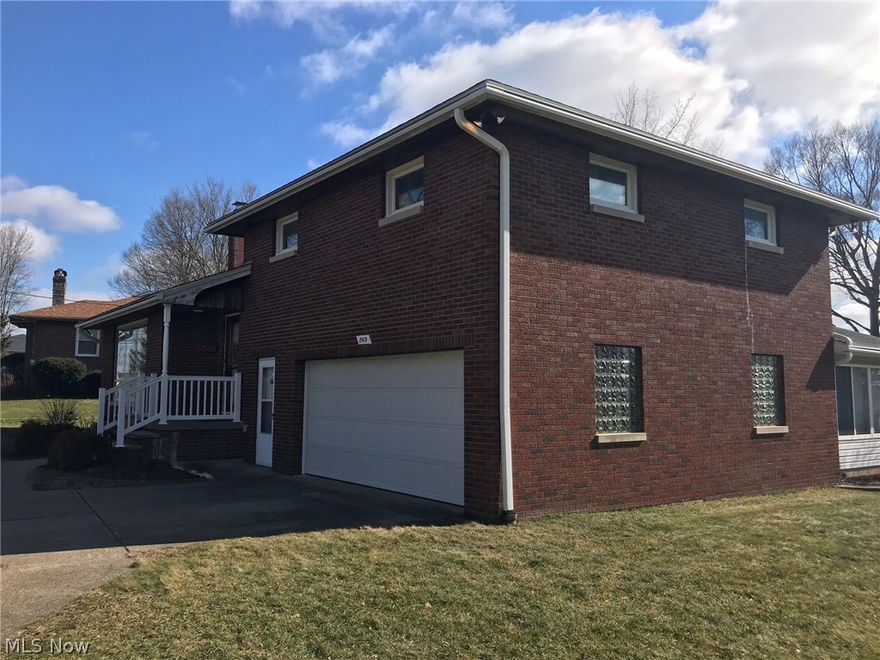 BEAUTIFUL BRICK BI-LEVEL with nice deep lot!   Attached Florida room with heat for extra living space.   2 fireplaces ~ some freshly painted rooms, huge walk-up attic.