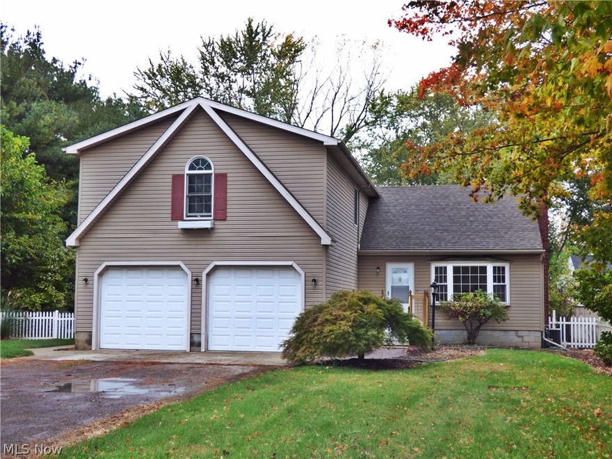 Spacious 5 bedroom home in Huron!  This home sets back approximately 100' from the road and features large bedrooms - 1 bedroom on the main level and 4 bedrooms on the 2nd floor, 2 full bathrooms with 1 on each floor, 2 car attached garage and partial basement.  Enjoy relaxing on the large composite deck overlooking the fenced in backyard.  New Roof in 2015.