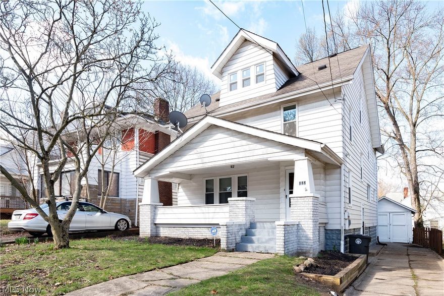 Check out this beautifully renovated home in Akron's International District!  Enjoy the neighborhood in the summer from your large front porch.  Inside, you're greeted by a large living room with gorgeously finished hardwood floors, built-ins and natural woodwork.  Beautiful French doors lead to your dining room with new chandelier.  The large kitchen features new countertops, sink, fixtures, stainless steel appliances (gas range/oven), and luxury vinyl tile flooring.  On the second floor you'll find 4 bedrooms all with refinished hardwood flooring and 3 with ceiling fans.  A spectacular bathroom with new bathtub, gorgeous tile surround, dual vanity with granite top and lighted mirror completes the second floor.  On floor number 3 you'll find a huge 5th bedroom with new double pane vinyl windows.  In the enormous basement, you'll find the second full bath, a large wooden bar, fruit cellar, and new high efficiency furnace.  In the warmer months you'll enjoy your back deck, fire circle, and fenced-in back yard.  Other updates include: total of 31 new windows, new central air conditioning, 2 new exterior doors, 3 new storm doors and new front retaining wall.  Minutes from downtown Akron, route 8, and Cuyahoga Falls.  Call your favorite Realtor and schedule a showing today!  Owner is a licensed real estate broker in Ohio.