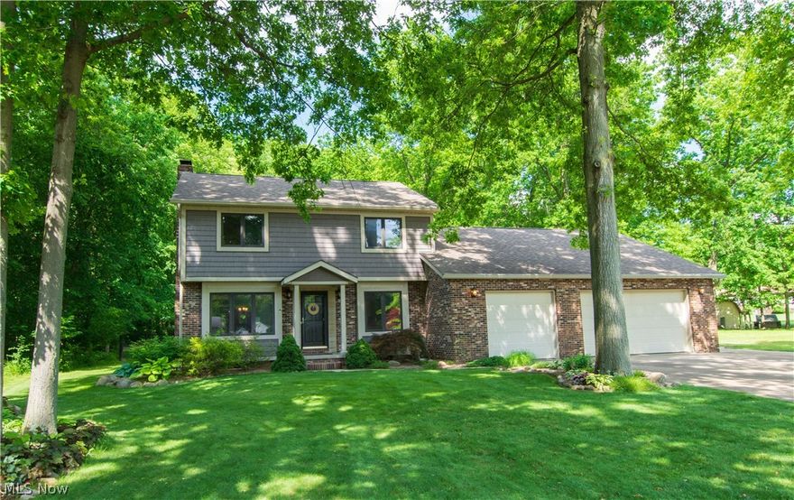 This beautiful Colonial home is tucked away on a quiet road in Green LSD. Offering over 3,000 sq. ft. of bright and spacious living space w a fun contemporary feel. An inviting foyer leads to the family room (left) and a breakfast nook (right). The family room features a beautiful floor-to-ceiling gas fireplace and leads to the dining area, great room, and kitchen. The great room offers surround sound throughout the house and a walkout to the patio that overlooks the large yard. The private backyard is great for entertaining friends & family; the patio even offers a natural gas hookup for grilling. 4 seasons room w a vaulted ceiling and lots of windows sits off the great room. The kitchen has a double island, skylight, granite countertops, stainless steel appliances, and a custom backsplash by Mac Worthington. Finishing up the main floor is a convenient bedroom, half bath, laundry room, and access to the 3-car garage. Four bedrooms & two full baths, including the master suite, are on t