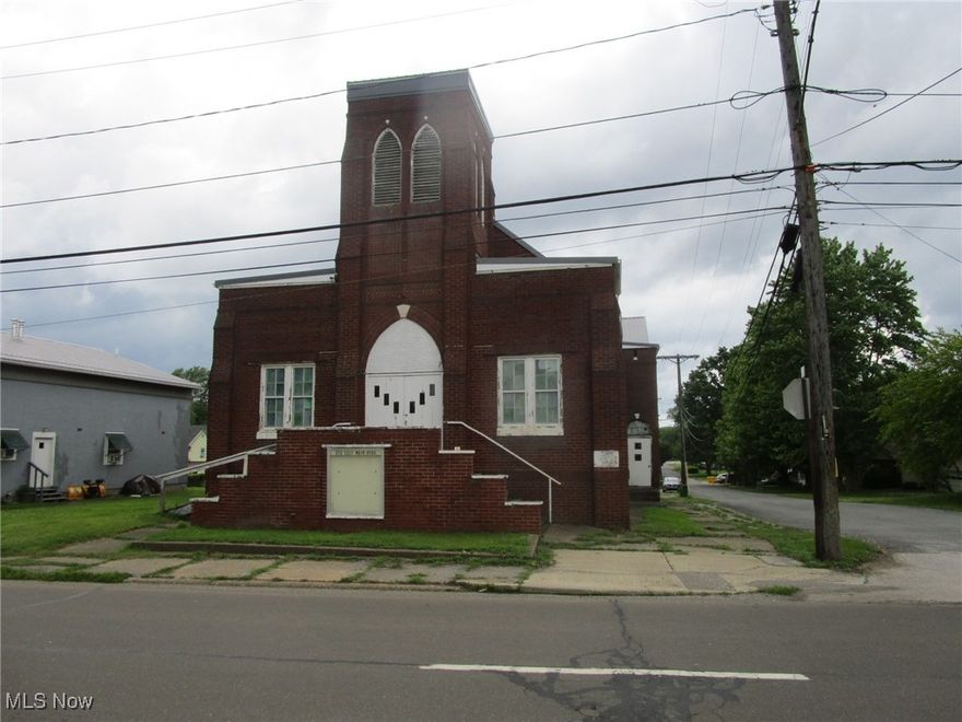 This is a lovely old brick Church on a large, corner lot in a great location. Its close to Route 90, Route 20 and historic downtown Conneaut. The Lot is L shaped & provides plenty of parking space. The large sanctuary is approximately 34 x 56 & would probably seat 150-175 people. On the main level are several rooms which would be great for office or classroom use. The lower level features 2 half baths, 1 full bath, a kitchen & a large social hall/cafeteria/conference area (approx. 32' x 40). In addition to that large area, there are several more classroom/training rooms at your disposal. The seller added the new 40 year metal roof in 2013 and also the ventless gas heater in the kitchen. It has currently been taken down to the studs, plumbing is only operable in one of the bathrooms, there is no heating source and power is off. Water is currently on. The building needs a lot of repair and clean-up - use caution when viewing.  Come see it - put your imagination to work & restore this classic old brick building to her former beauty! Large parking space in rear offers plenty of room for visitors and guests.