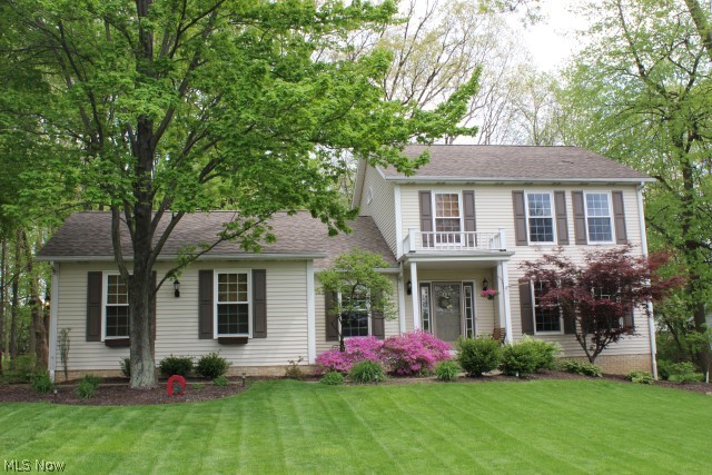 Absolutely beautiful-Inside & Out! Custom built w/much attention to detail* 2956SF including 700SF in finished lower level* Vaulted family room w/new patio door (2013) & wood burning fireplace w/gas starter* Vaulted 1st floor den w/wall of built ins (could be bedroom if needed)* Eat in kitchen w/Kraftmaid cabinets, large pantry, ceramic floor, roll out shelves, updated appliances (refrig, range, DW, microwave) & disposal* Formal dining room* Vaulted master* Outstanding laundry room w/built in cabinets, ironing board & work center* Lower level rec room & additional bedroom or office, light & bright* Generous 2 car side load* Updates roof & softener(2yrs), furnace & H2O (5yrs), roof (2011), windows (2yrs), deck (6yrs), downspouts/drainage (2012)-all dates/yrs are approx.* Park setting treed & private w/deck, play area & 10x12 out bldg.* Many extras* A pleasure to show!