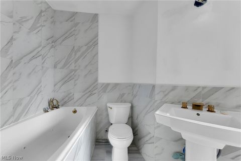 Tiny photo for 1077 E 169th Street, Cleveland, OH 44110 (MLS # 5187616)