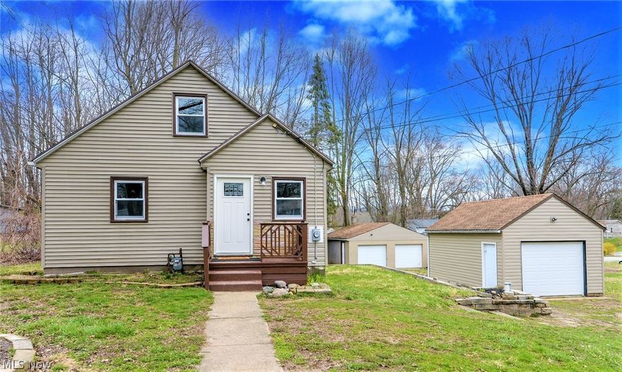 *Completely REMODELED Home In Springfield Township W/1,450 Sq. Ft Of Finished Living Space Includes 3 Bdrms, 1 Full Bathrm & Partially Finished Walkout Lower Level On .41 Acres!! **Auto Lovers, Mechanics This Is For You --> 2.5 Car (Almost 700 Sq. Ft) Oversized Detached Garage PLUS 1 Car Detached Garage!! *Updates Include: NEW VINYL WINDOWS, FURNACE, Plumbing, ELECTRICAL Including Panel, ALL Garage Doors & Entire BRAND NEW Interior! *LUXURY Plank Flooring Throughout *Grey Walls, White MODERN Trim *Walk In To A Living Rm OPEN To Kitchen That Features Brand NEW Fresh White Arcadia Shaker Style CABINETS, New Stove & Dishwasher, Beveled Edge Countertops W/Backsplash, Subway TILED Wall Backsplash, Faucet W/Sprayer & Stainless Sink. Black Led Flushmount Lighting *TWO First Floor Bedrooms *Sleek Full Bathroom Includes A NEW Bathtub & Surround, Black Rain Shower Head & Faucet, White Vanity/Countertop & 4 Sconce Lighting *Upstairs Features A Large Master With Ample Space For A Bed + Set Of Dres