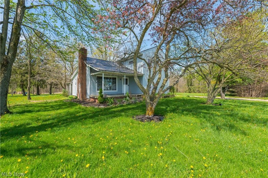 Refined country living on 3 private acres in Wakeman - Pond views, a statement barn, and timeless charm!!!

Welcome to this one-of-a-kind colonial nestled on 3 beautiful acres offering 2,068 sq ft of living space. This unique property blends charm, character, and opportunity—all in a peaceful country setting.
Step onto the inviting front porch and into a home filled with warmth, featuring a stunning wooded kitchen that flows seamlessly into the open-concept layout—perfect for both everyday living and entertaining. The main level includes a full bedroom and bath, ideal for guest accommodations or flexible living. New vinyl flooring extends through the bedroom, bathroom, and family room, creating a clean, modern aesthetic. Enjoy warm ambiance with two fireplaces—a timeless wood-burning centerpiece in the living room and a contemporary electric feature in the family room.
Upstairs, you’ll find two additional bedrooms, including a spacious primary suite with a his-and-hers en-suite bathroom already plumbed and ready for your personal finishing touches. The laundry area is also conveniently located on the second floor.
Recent updates provide peace of mind, including a tankless hot water system (2024), furnace (2024), and Pro + Aqua Elite water filtration system (2024). The home also features dual water access (city and well) and a durable metal roof.
Outside, the property truly shines. Enjoy your own private pond, a covered back patio, side deck, and expansive driveway space. The impressive tall barn with soaring ceilings offers endless potential—whether for storage, hobbies, or future projects.
If you’ve been searching for space, privacy, and character—this property delivers! Call for your private showing today !!