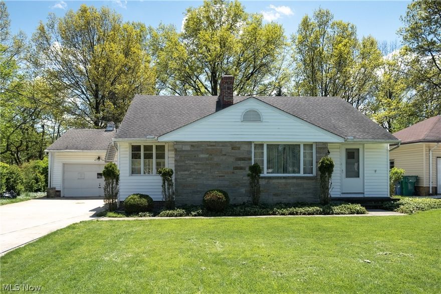 Welcome home to this charming Ranch in Seven Hills! Situated on a spacious and flat lot on Mapleview Drive, you’ll love living on this quiet street lined with mature maple trees. Entering through the front door, you are greeted by a large family room with cove ceilings and picture windows that let in an ample amount of natural light, plus a beautiful brick wood burning fireplace. Freshly refinished hardwood floors throughout the majority of the home. Eat in Kitchen. Three bedrooms with hardwood flooring and an abundance of natural light streaming in. Downstairs, find a spacious unfinished basement with plenty of potential to be converted into a recreation room! Beautiful backyard with mature trees and covered patio. Choice location as Mapleview Drive is located off of Broadview, with convenient access to Seven Hills shopping, dining, and just minutes away from access to I-77 and I-480. Better yet, it’s just a short walk to spend sunny days and warm evenings at Calvin Park! This home is
