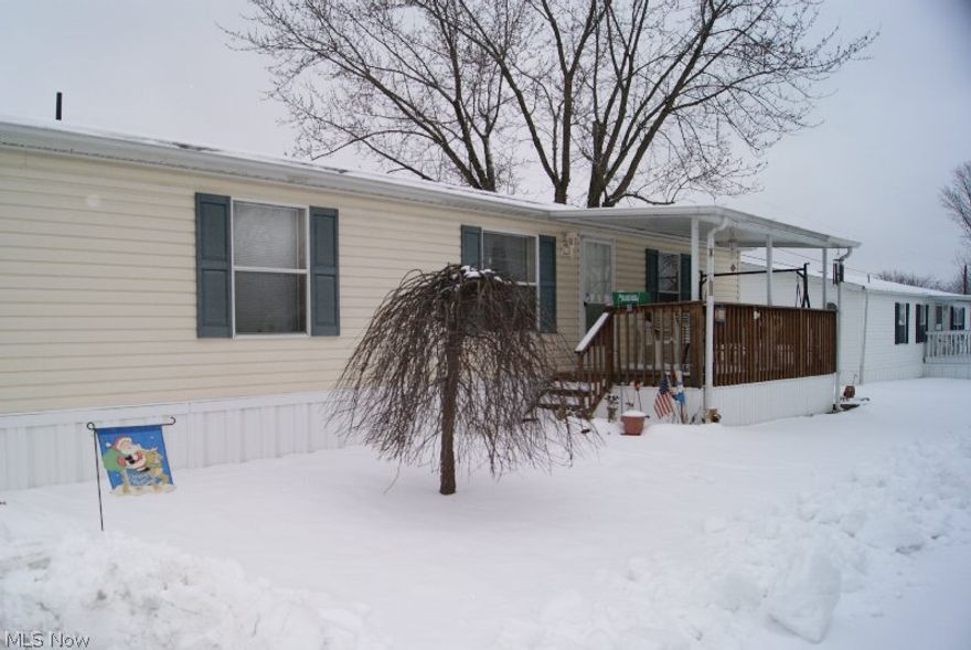 Well loved 3 bedroom, 2 bath double wide mobile home in Westview Mobile Home Park. Minutes away from expressway with easy access to Akron, Canton and Wooster. Master Suite features a master bath with walk in shower. All three bedroom have nice closets. Eat-in kitchen with newer vinyl flooring. Open living room and dining room. Concrete drive with parking for 3 cars, covered car port and front porch. Shed for extra storage. Carpeting in living room and bedroom #3 is newer. Hot water tank was replaced in 2012, new heat wrap in 11/2014. Exclude master bedroom and bedroom #2 curtains.