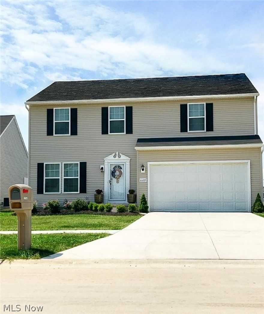 RARE FIND! Take a look at this bright North Ridgeville home! This beautiful four bedroom, four bath house is ideally suited for everyone in the suburbs in Northeast Ohio! Beautiful open areas and high 9 ft. ceilings make this home great for entertaining. Both stylish and elegant, this home can be easily customized to add your own personal touch. Featuring extra windows, a cozy fireplace, morning room and finished basement, this home is the perfect blend of comfort and style! This home features: LOTS of storage, wood kitchen cabinets, good insulation, a patio, two car garage, and gas heating. All appliances stay.