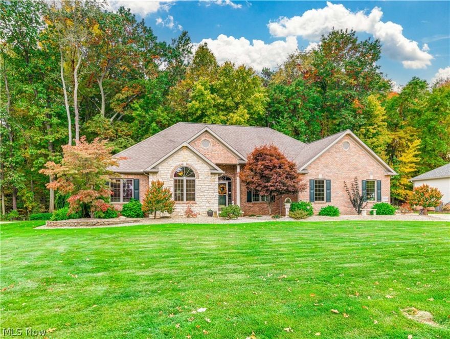 Absolutely beautiful, custom built Skip Rea ranch style home nestled in a park like setting in the heart of Jackson Township.  This stunning open floor plan features a gorgeous kitchen with under and over cabinet lighting, newer stainless steel appliances, abundant cabinet and counter space and a huge walk in pantry, charming dinette with bayed window, a welcoming family room with gas fireplace and cathedral ceiling,  formal dining room with circle top window, a spacious owner's suite with large walk in closet and luxury full bath whirlpool tub, separate shower and double sinks.  First floor laundry has built in ironing board and cabinetry, built in speakers in many rooms, oversized garage.  Central air conditioning installed 2012 and hot water heater 2016. A relaxing sunroom overlooks the garden like backyard complete with a brick edged patio and firepit.  This home is truly amazing!