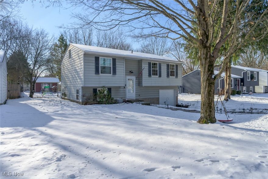 Welcome home to this beautifully renovated gem nestled just minutes from downtown Kent, where charm meets modern comfort. Thoughtfully updated from top to bottom, this home offers peace of mind with significant improvements already completed while still delivering warmth and character throughout.

Step inside to find laminate flooring installed in 2018 that flows seamlessly through the home, complemented by abundant natural light and refreshed living spaces designed for everyday living and entertaining. The kitchen was updated in 2025 with new laminate countertops and sink, along with appliances including a stove and microwave (2018), washer and dishwasher (2021), refrigerator (2023), and dryer (2018), creating a functional and inviting heart of the home.

The upstairs bathroom was fully renovated in 2019, featuring a tiled shower, updated flooring, and a vanity with quartz countertops. Extensive behind-the-scenes improvements include household plumbing redone in 2024, including a tankless water heater installed in 2025, a furnace and A/C installed in 2023, solid MDF interior doors added in 2019, and updated lighting and ceiling fans throughout the upstairs bedrooms.

Outside, enjoy a fenced-in backyard—perfect for pets, gatherings, or relaxing. A deck and shed, both added in 2022, enhance the outdoor living space, while the built-in cabinetry on the stairway, installed in 2023, adds thoughtful storage and character.

Additional improvements include a roof replaced in 2018 and basement waterproofing with a sump pump completed in 2024. With extensive renovations completed over the years and a prime location close to downtown Kent, shopping, dining, and Kent State University, this move-in-ready home offers comfort, style, and convenience in one complete package. Don’t miss the opportunity to make it yours.