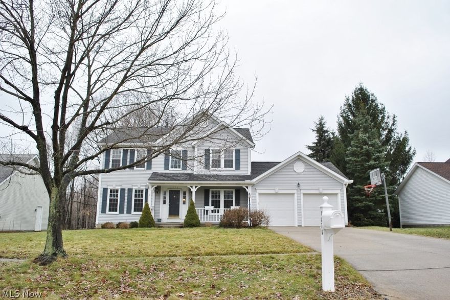 Beautifully maintained Colonial w/great curb appeal in quiet neighborhood! Many updates which include all new windows & patio door 2016 w/lifetime warranty, whole house air purifier/humidifier, landscaping 2015, stamped concrete walkway, 30 year roof 2008, new flooring throughout which includes Brazilian Teak wood floors, ceramic tile & new neutral carpeting will be installed in all carpeted areas on 1/30/17, newer stainless steel appliances in kitchen, all bathrms have been upgraded including granite countertops & new fixtures. Oversized 2-car garage w/new cabinets & countertop, private back yard with large deck. Call to schedule your private showing!