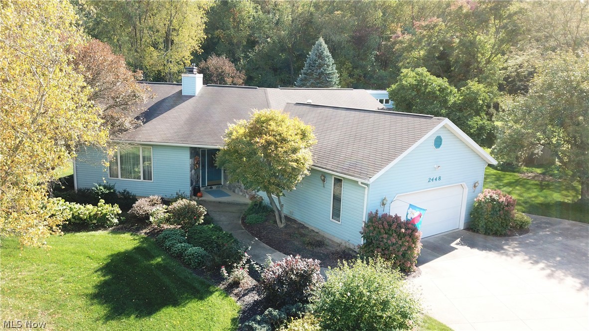 Welcome to 2448 Spade Road, a 3-bedroom, 3-bathroom home located on a quiet street in Uniontown! This lovely home has a recently re-modeled kitchen (2014) with beautiful floors, skylights, stainless steel appliances and gorgeous countertops. You will love all the cabinet space this kitchen has! The kitchen also has a bay window, an island with a breakfast bar, and spectacular Cathedral ceilings. The kitchen openly flows into the spacious living room that has large windows and a fireplace. In addition to the living room, this home has a huge bonus room that can be used in countless ways! There’s a spacious sunroom with Cathedral ceilings that leads to a deck overlooking the peaceful backyard. Home has central VAC system and a heated two-car garage. No worries as this home comes with a home warranty. Don’t let this home get away! Schedule your private showing before it’s too late!