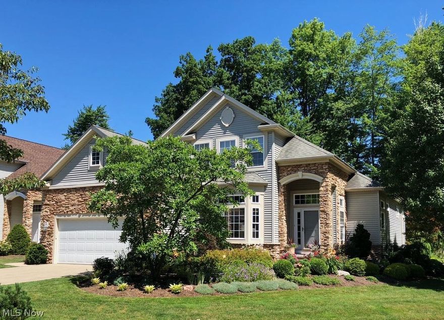 Meticulous 2/3 Bedroom & 3.5 Bath Free-Standing Stonehaven Condo! Home is spacious and excellent for entertaining family, friends and out of town visitors. Desirable open concept with over 3300 sqft of living space, beautiful hardwood floors & loaded with upgrades! 2-story Great Room with fireplace open Dining Room & Foyer. Large Eat-in Kitchen with breakfast bar, pantry & appliances open to bright & airy Breakfast Room with sliders to large stone paver patio with built-in coy pond, tumble stone wall & fire pit. 1st floor Master Bedroom includes private Glamour Bath with jetted tub. Second floor includes additional bedroom, full bath & loft area. 1st floor Library/Den with custom built-ins. Full finished lower level includes Rec/Family Room, Office or possible 3rd Bedroom, Full Bath, workout/craft area with epoxy floor & great storage area. 1st floor Laundry Room. 2-car attached garage. Great location in the middle of Quail Hollow with one of the best golf course views. Private with go