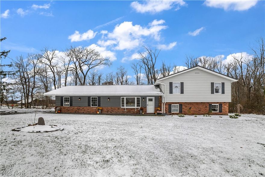Nature abounds on this beautiful 3 3/4 acre private wooded property! Located in the much desired West Geauga school district, right off of route 44, conveniently located near local and state parks, as well as UH Geauga Medical Center! This NEWLY RENOVATED home offers 4 bedrooms, 2 1/2 bathrooms, high quality hand scraped pergo flooring, engineered real wood bamboo flooring, a very appealing kitchen that is fully equipped with BRAND NEW appliances, interior that provides plenty of natural light, and a living area equipped with a fireplace that can be set up as a wood burner, pellet stove, or electric! The whole house is LED which helps keep the electric bill extremely affordable! This home has a serene park feel that provides plenty of space to explore, garden, entertain, or even have your own mini farm. You must come see this property to appreciate its beauty. Please come see and feel the tranquility and warmth of this newly renovated property and schedule your private showing today! [