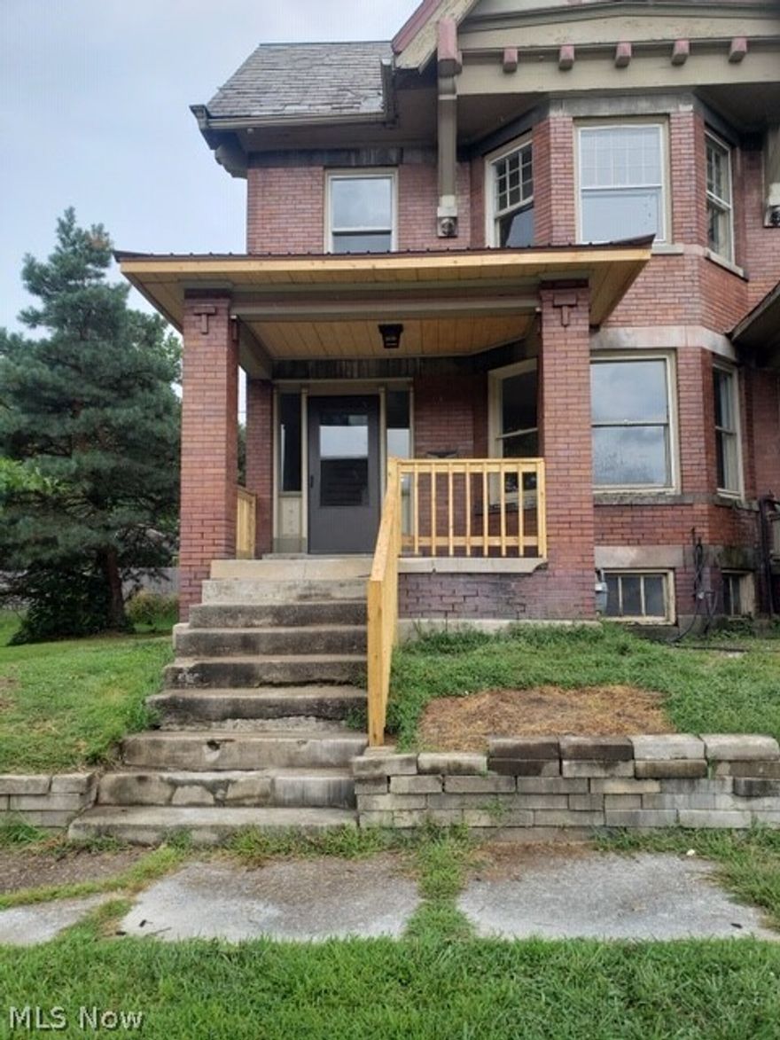 Beautifully remodeled 3 bedroom, 1 bath townhouse. Hardwoods and built-in storage throughout, new kitchen, 1st floor laundry hookup. Fireplace in living room (decorative only). Full basement and attic. One year lease, security deposit $850. Street parking. Rent includes water, sewer, trash and lawn care.