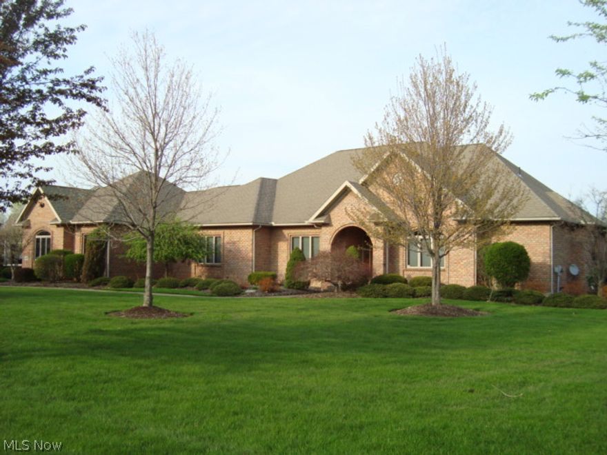 New on the market! This stunning custom built Ranch is located on a quiet cul-de-sac in Pambi Farms. It features a beautifully landscaped double lot with an open view of the lush golf course in the backyard. You can enjoy this view whether you're relaxing on the large patio or inside the spacious living area. The interior offers: Oak doors and trim throughout, three bedrooms, two full baths (double sinks in both), a half bath, living room w/cathedral ceiling and fireplace, formal dining room, fully equipped kitchen, office/den, family room, master bedroom w/jacuzzi and large walk-in closet, and first floor laundry. If you love to entertain or just escape to your own space, you'll love the extra 1,500 sq/ft of additional living space on the lower level. This level features: large wet bar, media area, half bath, and also extra closet and storage space. Other extras include: security system, intercom/audio system throughout, nature stone flooring in garage and outside patio. A must see!