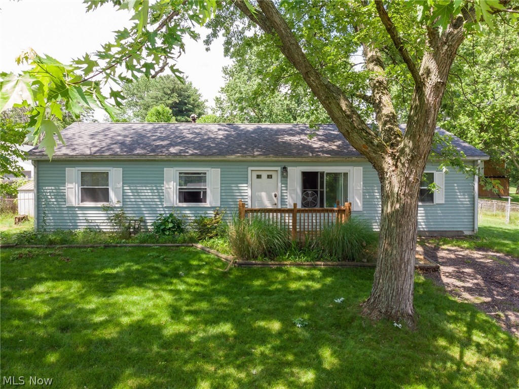 Inviting 3 Bedroom Updated Bath Ranch home, Melody Village of New Franklin Clinton area, Franklin Township w/ Norton City School District. Don't miss out on this opportunity to live on almost a half acre w/ fenced rear yard & rear concrete patio for relaxing, grilling or dining! Custom built shed is 16' x 12' plus loft so large enough for yard equipment, workshop & storage! Charming front deck entry w/ landscaping adds character to large front yard w/ mature trees, extra parking in long, wide driveway & lush grass. Step into home on slate tile entry w/ large double door coat closet w/ shoe storage; huge living room with engineered hickory wood flooring of deep tones lends beautiful look to this oversized living space, can even create 2 separate living areas, one for reading and one for media! Opens to eat-in kitchen w/ tiled floor for ease of cleaning overlooks gorgeous back yard through sliding glass doors! Kitchen has a great layout includes the refrigerator, dishwasher, oven/stove,