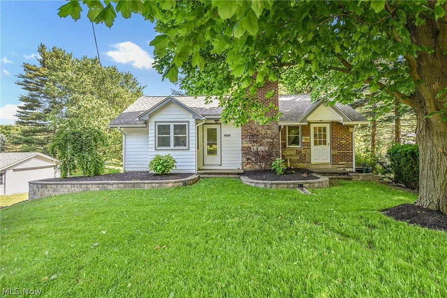 Better than new - completely updated, yet full of charm! 4-5 bedroom ranch on beautiful 1.2 acre lot. Gorgeous kitchen with white cabinetry, tile backsplash, oversized stainless steel sink, new countertops, and new flooring.  Large living room with woodburning fireplace and new carpeting.  Family room in walk-out lower level opens to covered patio overlooking your private backyard.  2.5 car garage complete with woodburner.  Updates include plumbing, electric, windows, doors, flooring, submersible well pump, landscaping, paint, and MORE!