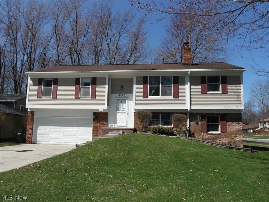 Four bedrooms with a possible fifth in a family friendly neighborhood! A 2005 addition expanded living space on both levels creating 4th bdrm and bonus room! An upper level deck overlooks the treed third-acre lot or relax on the patio below. Fully applianced kitchen w/laminate flooring, master bdrm w/walk in closet & office, fireplace, large laundry/utility room & tons of easy access attic storage.