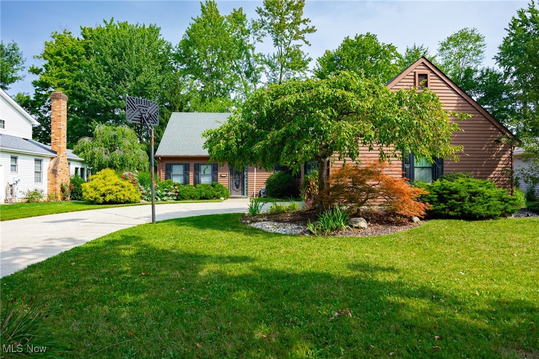 Welcome to your new home! This 3-bedroom, 2-bathroom Cape Cod is nestled in a quiet and inviting neighborhood in the heart of Elyria. With its classic design and modern amenities, this property seamlessly combines comfort and style. As you walk in the home you're just a few steps away from the kitchen that is fully equipped with new modern appliances, ample cabinetry, and a convenient layout that encourage family gatherings. Enjoy the secluded screened in patio with a large hot tub! As you walk outside you will appreciate the freshly landscaped and inviting backyard with wooded views. This home also features a new hot water tank (2022), central air, a fully functioning wood burning fireplace, newer carpet in all 3 bedrooms, updated bathroom, heated garage with insulated door and a new man door, brand new Trane air conditioner (2024), and an electric 220 amp in the back shed. Located in a quiet neighborhood, this amazing home offers the perfect balance of privacy and community. Don't miss your opportunity to make this your new home and schedule your private showing before it's too late!