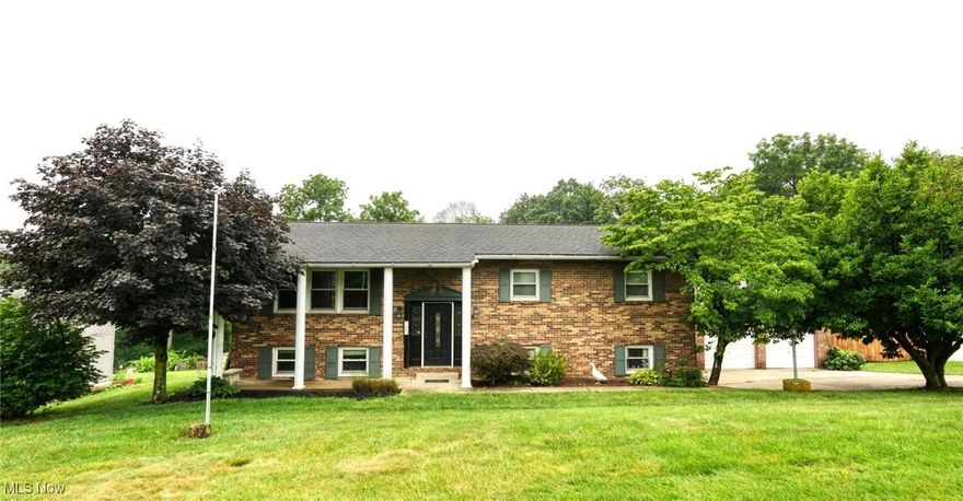 Nestled in quiet and serene Linvale Estates and in the East Muskingum School District, this beautifully maintained split-level home offers convenient access just off State Route 40 and under 2 miles from I-70. With three spacious bedrooms and three full bathrooms, the home is perfect for both everyday living and entertaining. Enjoy multiple living spaces, including an upstairs living room and a large finished family room in the lower level, complete with a fireplace and its own full bath. Step out from the family room to a screened-in porch and a private backyard. Additional features include a deck off the dining room, an attached two-car garage, and a detached two-car garage with an extra room and attic for ample storage.