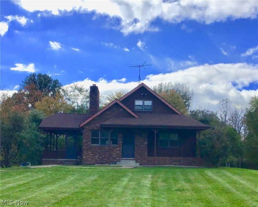 Country living near the city! Surrounded by mother nature, mature trees, creek, landscaping & wildlife... you wont want to miss out on this solid 3 bed, 2 bath home situated on almost 4 acres just outside the city limits and close to schools, parks, YMCA & town. Features include: 
12' x 23' Mini Barn, 10' x 12' Storage Shed, 12' x 19' covered porch, 2 single car attached Heated Garages (garage #1 is 13' x 23' & garage #2 is 12' x 19), Loft Master Bedroom with large walk in closet over looks the Great Room with Cathedral Wood Ceilings & converted Gas Fireplace, Rec. Room located in walk out basement with additional Bonus Room that could be used as 4th Bedroom, 1st Floor Laundry, Gas Furnace replaced approx. 4 years ago, Roof approx. 5 years old, New Carpet, Outside Security Lighting and ample parking for entertaining guests. Bring your personal touches and make this home your own! Rear corner of property near the creek is deemed Flood Zone AE, the rest of the property is not located in