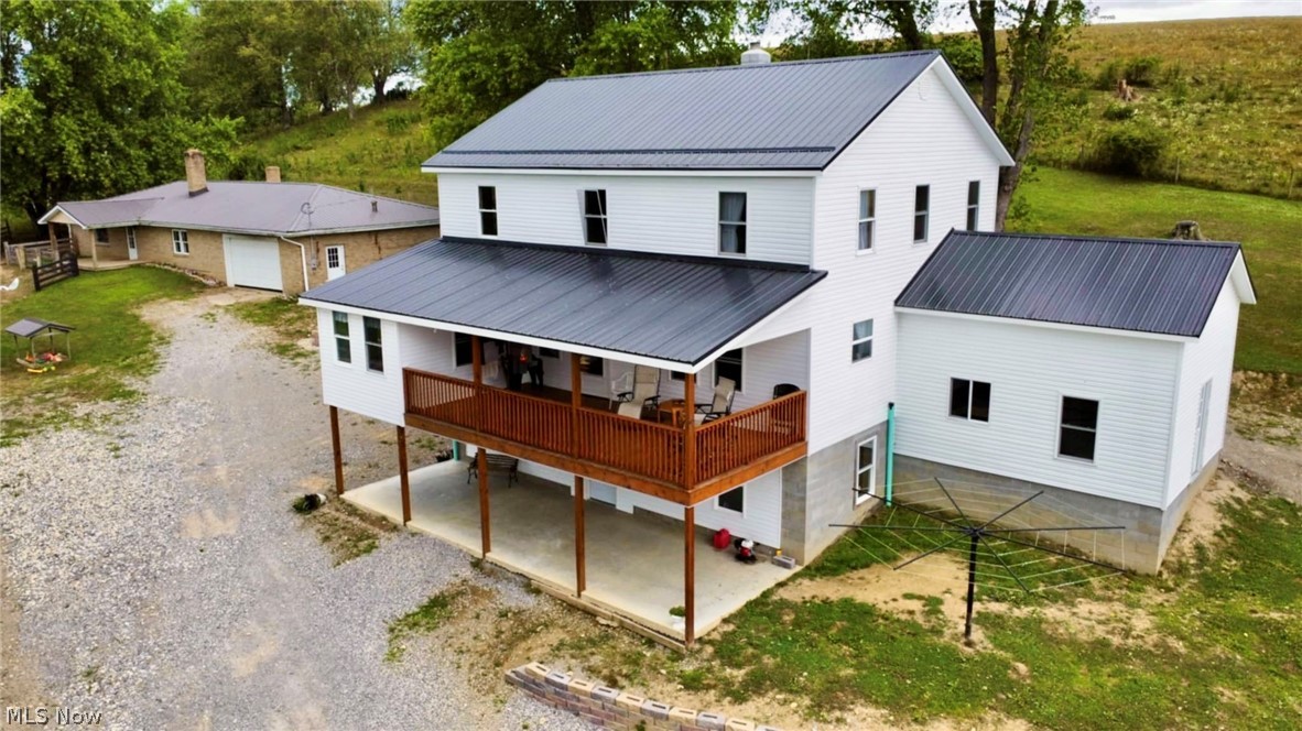 Check out this open concept, amish built, newer construction home on over 5 acres! Make this your dream farmhouse in the countryside of Harrison County. This stunning home was just built in 2023, and the sellers have left the walls partially unfinished for the option of adding electricity or ductwork for an HVAC system. This beautiful home offers a large barn with 2 stories, a garden, fenced in pasture fields, and even an additional home with an attached garage on the property that was once lived in, but is now used as a shop. This building can easily be returned to be a guest house, an investment property for a rental, or Air BnB considering this home resides in the middle of Tappan, Clendening and Piedmont lakes. Enjoy the peacefulness of the countryside while still being within easy reach of local amenities, shops, a school, etc. The potential here is endless, don't let this one pass you by! Contact Brandi or your favorite agent for a showing today!