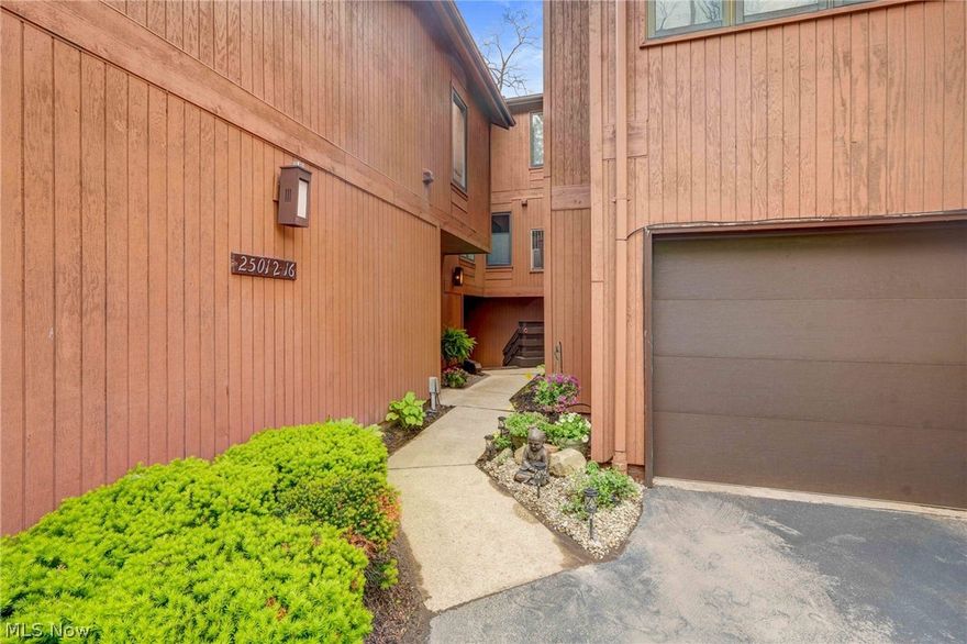 Welcome home to this beautiful riverfront condo offering a private retreat with stunning views. The light filled, open concept layout is sure to impress, featuring an updated kitchen with white shaker cabinets, leathered granite countertops, tiled backsplash, breakfast bar, double sink, and stainless steel appliances that remain.  The vaulted living room showcases a dramatic floor to ceiling fireplace with new glass doors and mantle, abundant natural light, and access to your composite deck overlooking the Rocky River.  The next level includes a fully updated bath with new tile, tub, flooring, and vanity. The bedroom on this floor offers a massive walk in closet and a convenient laundry room with a newer washer and dryer that stay.  The lofted primary suite serves as an ideal retreat and includes its own updated bath.  Major recent improvements within the last few years include a newer furnace and AC, new skylight with remote, custom window treatments, composite decking, custom storage, and epoxy flooring in the attached 1 car garage.  This is a rare opportunity to own the best view in the community. Ideally located near historic Olmsted Falls town square, offering charming shops and restaurants. Experience the ease of maintenance free living — schedule your appointment today.