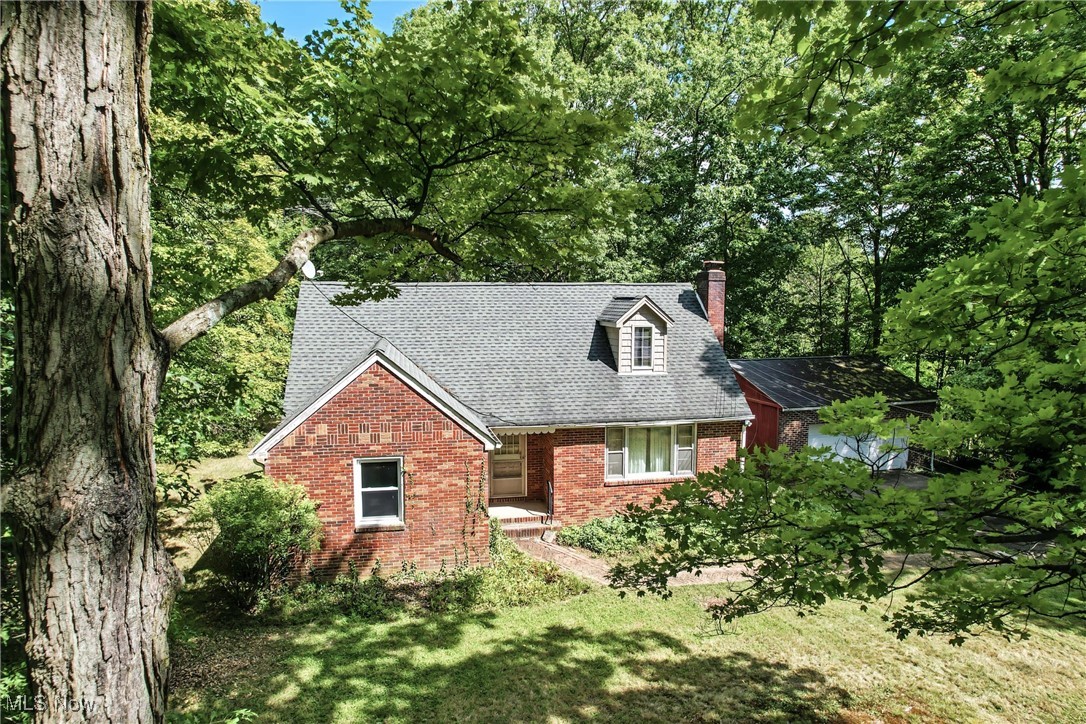 Welcome to a rare opportunity to own a piece of serene country living in a highly sought-after location. Discover this charming Cape Cod estate, a perfect blend of classic elegance and rustic tranquility, nestled on a sprawling 4.26-acre parcel that runs between S Raccoon Rd. and Canfield Rd. in Canfield, Ohio.
As you approach the property, a sense of peace and privacy envelops you. The home itself, a timeless four-bedroom, one-and-a-half-bath Cape Cod, exudes character and warmth. Step inside to find a welcoming interior that feels both spacious and cozy. On the first floor you will find the heart of the home in the inviting living room, featuring a stunning fireplace, kitchen, dining rm, full bathroom, and 2 bedrooms. The second floor offers 2 bedrooms, a large cedar closet and half bath. This can provide a full array of options for family or guests.
Beyond the main residence, the property's allure continues. A detached two-car garage provides secure parking and additional storage, catering to the needs of the discerning homeowner.
This exceptional property is a true gem, representing a unique opportunity. It is an ideal acquisition for a first-time homebuyer seeking a remarkable and enduring investment, or for anyone desiring the ultimate in privacy and land. This estate is not merely a home; it is a sanctuary, a blank slate for a lifetime of memories and a testament to refined country living. Experience the pinnacle of a private lifestyle at 4957 S Raccoon Rd. We invite you to discover this unparalleled offering—a true legacy property waiting for its next chapter.
This home has hardwood floors throughout and comes with a 1 year home warranty!