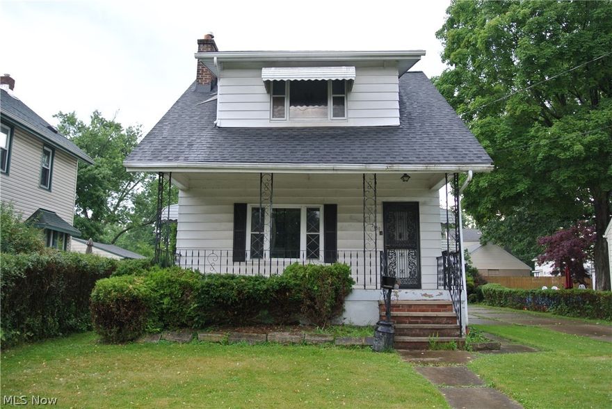 Cuyahoga Falls Colonial with loads of Potential. 2 Bedrooms, 1 Bath, Fireplace in Living Room, Dining Room and Sunroom . Deck and Oversized Garage. Newer Roof