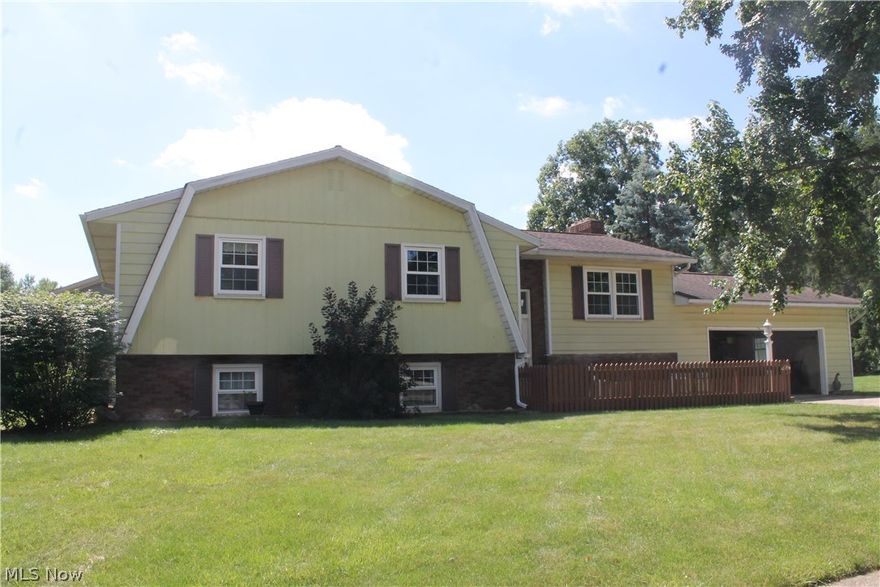 Wonderful Family Home in a very desirable neighborhood in Wadsworth. This home has a unique and very functional layout for a split level.  The lower half is home to a family room with double patio doors leading to stone patio. The kitchen has 2 pantries with lots of storage. Full bath and 1 bedrooms and a very large office with laundry attached.   The family room has direct access to the garage.  The second floor hosts another large living room, 3 bedrooms and the master bedroom with a full bath.  This home has been freshly painted and some new carpeting. Home Warranty is being offered thru America's Preferred.   check back soon for additional pictures.