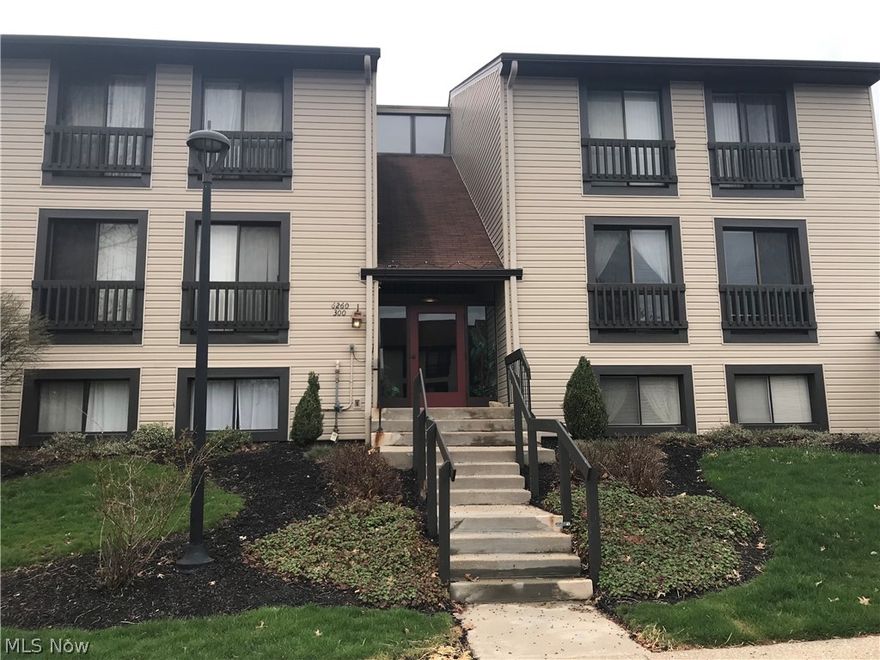 Enjoy all the amenities of Greenwood Village this summer while living in this spacious 2nd floor condo, just 7 steps up from first level !   Plenty of cabinets & counter space line the kitchen with adjoining dining area.  New dishwasher and garbage disposal, along with refrigerator & stove will stay.   Large comfortable living room for relaxing.  A nice covered patio located right off the living area.  Two spacious bedrooms with the master rockin' it's own master bath and walk-in closet.  There is an additional full bath and linen closet off the main hall.  One car garage allows for more storage.  A little updating with your personal touch will make this home.  Amenities include Indoor/outdoor pools, exercise area, playground, stocked pond, tennis courts, clubhouse (for those larger parties), all nestled between the metro park & Cuy Valley Nat'l Park. Oak Knolls had it's own Salt water Pool !  Convenient location w/easy access to Cleveland and Akron !