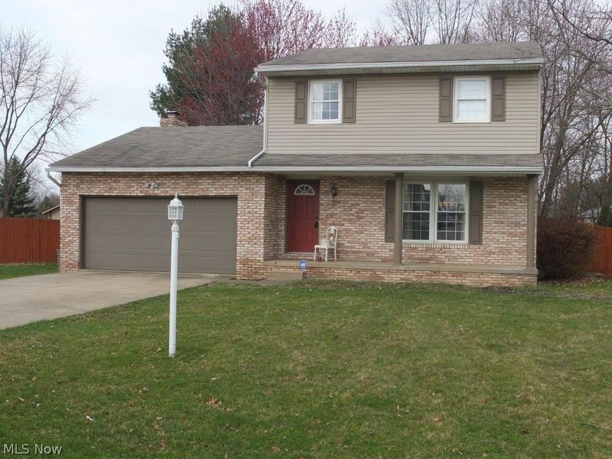 Wonderfully maintained 3 bedroom, 1.5 bath home with a private fenced-in backyard and spacious bedrooms! The formal living room lets in lots of natural light. Beautiful kitchen has tile flooring and backsplash as well as granite countertops and a pantry. Dining room opens to family room and has slider to back deck. The spacious family room has a gorgeous brick fireplace and a bay window. Convenient half bath on main level has tile flooring and solid surface countertop. Master bedroom has a large walk-in closet. 2 additional good sized bedrooms and full bath with tile flooring and solid surface countertop complete the second level. Private fenced-in backyard has a fantastic covered deck and a large storage shed! Come see all this home has to offer!