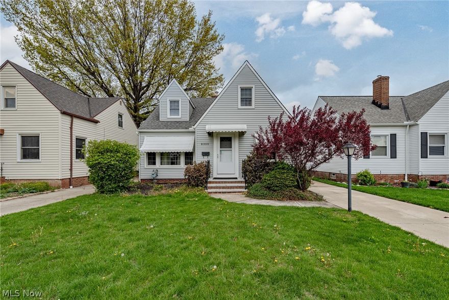 Move right in to this beautifully maintained cape cod in Parma! This charming house provides 3 bedrooms and 2 bathrooms with spacious living areas and everything you need to call it home. Illuminated by a picture window, the living room is spacious and inviting. Curved archways lead you into the kitchen, which features newer laminate floors, plenty of cabinetry, and a sunny eat-in area. On the first floor, you will also find two spacious bedrooms with ample closets and an updated full bathroom. The second floor includes a third bedroom with a charming window seat and desk area, plus a bonus area that is perfect for a home office! The full lower level is partially finished, and includes a large rec room, a laundry area, a full bathroom, and a workshop area. Outside, there is a detached 1-car garage. Recent improvements include newer siding and carpet, plus fresh paint throughout! Located just off of Ridge Road in Parma, this home provides easy access to area schools, shopping, dining, a