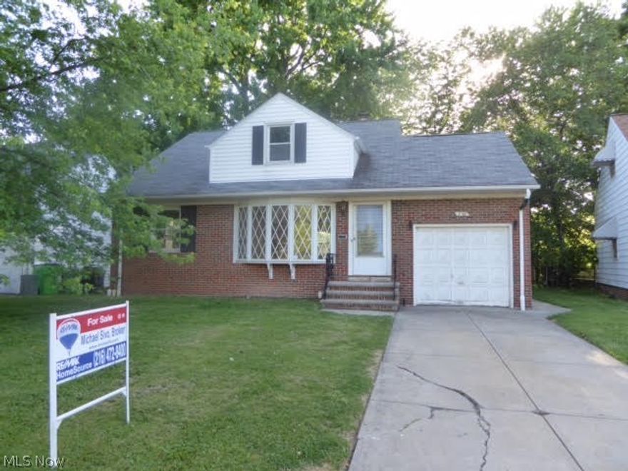 Spacious and charming Cape Cod with 5 bedrooms and 2 full baths!  Imagine the potential!  Nice sized eat in kitchen with double oven.  Formal dining room opens to deck with fenced yard. Finished rec room with bar, great for entertaining, and glass block windows.  Brick and Vinyl siding add to the value and curb appeal!  A must see at a great price.