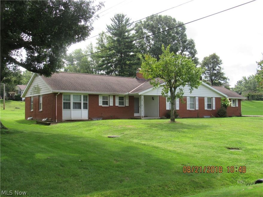 Large brick ranch on North end of Zanesville. Close to shopping, Doctors and hospital. Formal dining room, formal living room, and nice family room all on one floor!! Master bath with walk-in shower. Screened back porch overlooking nice level yard.