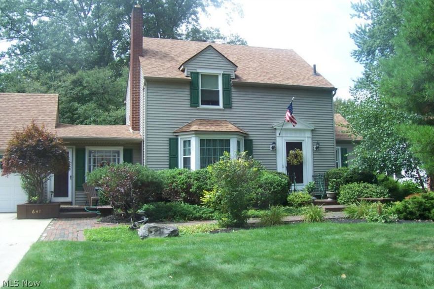 Priced to Sell!  Enjoy the view from the heated Florida Room with patio doors to the wood deck and patio.  Kitchen has new counter tops and ceramic floor.  Bay window in the living room and dining room.  Garage offers upstairs workshop.  Bedrooms upstairs offer walk-in closets.  Nicely landscaped.