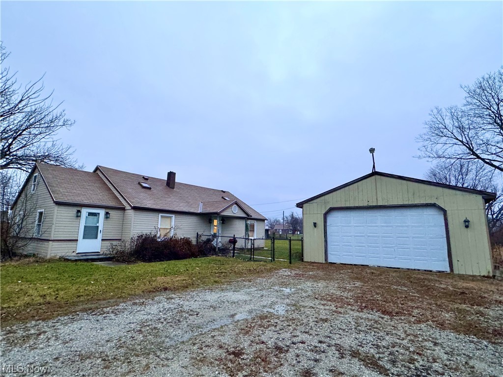 If you love fishing, boating, enjoying time outdoors, fun adventures, the Toussaint River, Oak Harbor, or Lake
End ther Late tre/Tousain River airacing, tis fenced in propety with 24r40 arag is complete win fah Clening
station and more! Inside, you will find 3 bedrooms, 1.5 baths, large eat-in kitchen with plenty of storage, living room, cozy nooks for playing games or reading, and optional 4th bedroom space. The spacious yard is fenced in with wooden privacy fence and black chain link fence. Walk to the end of the side yard or across the road to dip your toes in the Toussaint waters! The sheds in the back offer a multitude of options, and the property comes fully furnished, including the 22ft Celebrity cuddy cabin boat in the garage with 305 chevy inboard motor, trailer, new deluxe depth fish finder and GPS at the listing price. Current owners air bb the property for a range of $230-350 per night, depending on season and area tournaments. Updates include fencing, new flooring throughout, finished upstairs, interior paint, new appliances, new upstairs windows, trim installed on the main level, window AC units, new TV, updated baths, and more. Contact your favorite agent for a personal view of what the possibilities of 2024 might bring while owning this amazing property!