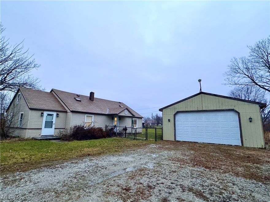 If you love fishing, boating, enjoying time outdoors, fun adventures, the Toussaint River, Oak Harbor, or Lake
End ther Late tre/Tousain River airacing, tis fenced in propety with 24r40 arag is complete win fah Clening
station and more! Inside, you will find 3 bedrooms, 1.5 baths, large eat-in kitchen with plenty of storage, living room, cozy nooks for playing games or reading, and optional 4th bedroom space. The spacious yard is fenced in with wooden privacy fence and black chain link fence. Walk to the end of the side yard or across the road to dip your toes in the Toussaint waters! The sheds in the back offer a multitude of options, and the property comes fully furnished, including the 22ft Celebrity cuddy cabin boat in the garage with 305 chevy inboard motor, trailer, new deluxe depth fish finder and GPS at the listing price. Current owners air bb the property for a range of $230-350 per night, depending on season and area tournaments. Updates include fencing, new flooring throughout, finished upstairs, interior paint, new appliances, new upstairs windows, trim installed on the main level, window AC units, new TV, updated baths, and more. Contact your favorite agent for a personal view of what the possibilities of 2024 might bring while owning this amazing property!