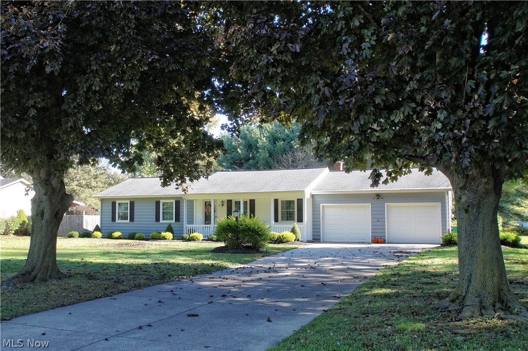 Here is that spacious classic ranch you have been waiting for to raise your family in the most desirable subdivisions in Madison, Square Acres! This home is situated on a large lot with an over sized 2 car garage, along with a full basement. This 3 bedroom 2 full bath home features a newly remodeled eat in kitchen which opens up to a large great room. The great room features a full wall raised hearth brick fireplace with a remote start, beamed ceiling & a bayed window looking over the back yard. Many more features include a formal living room, dinning room & a full bath in the master bedroom. For your peace of mind, many updates have been completed to this home over the years to include, updated kitchen & bathrooms, new thermopane windows, stamped patio area, new patio awning, new water heater and landscaping. Both the roof & furnace are young in years. You will find the back yard kid friendly & pet friendly with it's partially fenced in yard.